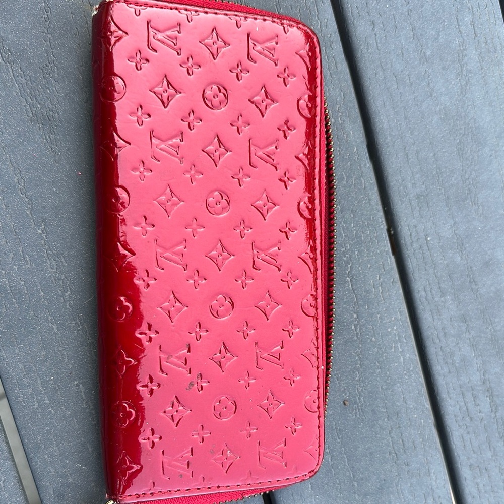 Red Leather Wallet with Iconic Embossed Design